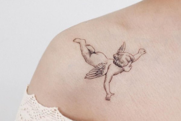 collarbone-angel-tattoo-women-water.jpg