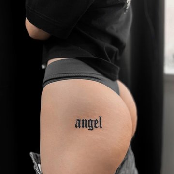 тату на бедре